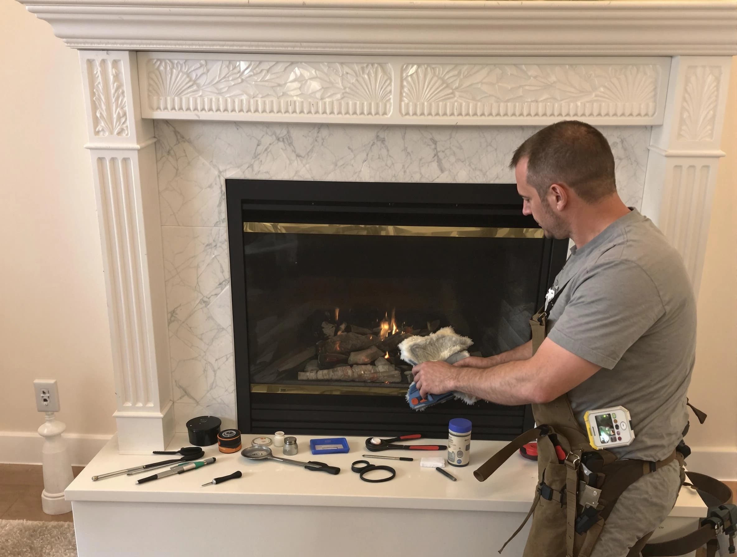 Jeannette Chimney Sweep performing fireplace maintenance in Jeannette, PA